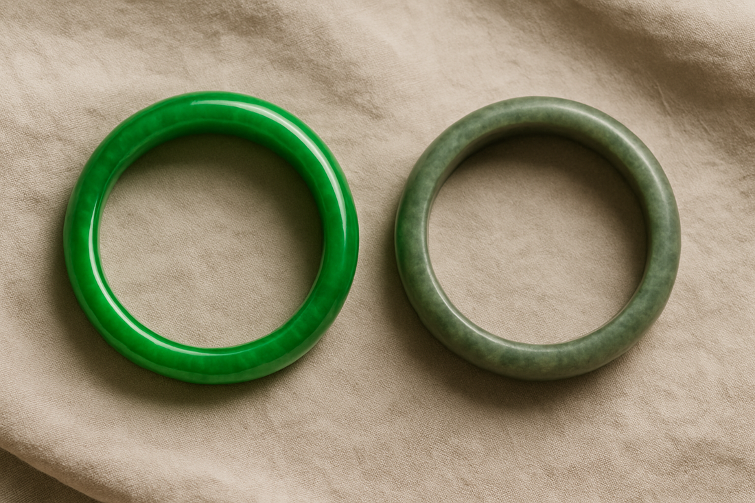 Two jade bangles resting side by side on soft beige fabric—one vibrant and glossy, the other matte and muted—illustrating how jade can subtly change color or luster over time.