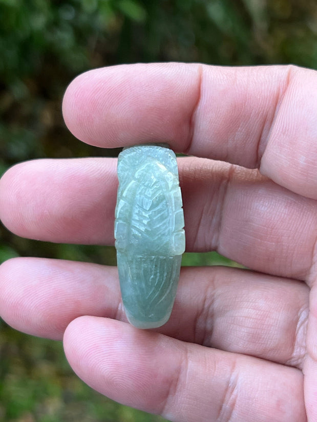 Vitreous luster and cool luminous glow of hand-sculpted certified Grade A Myanmar jadeite jewelry