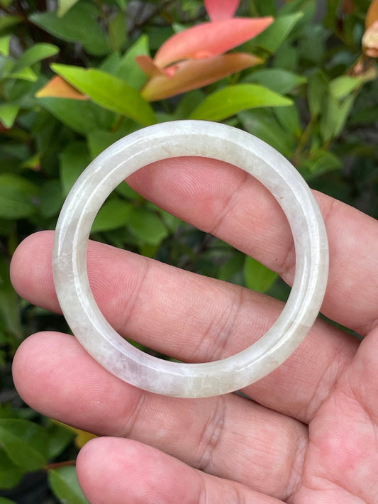 Solid icy light yellow, white, and lavender natural Type A Burmese baby jade bangle bracelet in size 44.5mm