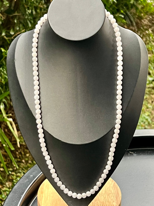 Soft glassy luster and fine crystalline texture of the 6.4mm authentic Myanmar jadeite bead necklace JN014