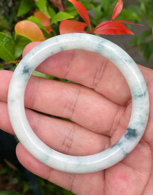 Solid milky white and imperial green natural Type A Burmese jade bangle bracelet in size 58.5mm