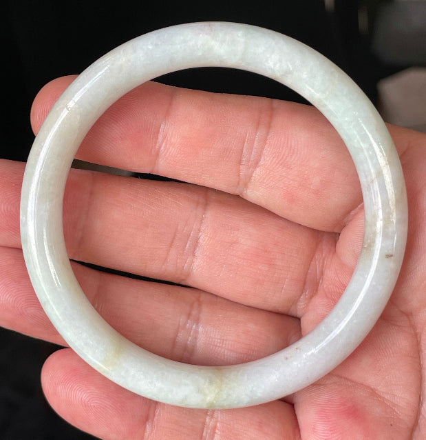 Glassy luster and fine crystalline texture of the authentic Myanmar jade princess cut bangle JB240