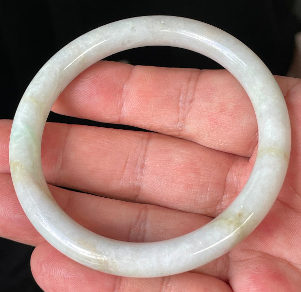 Glassy luster and fine crystalline texture of the authentic Myanmar jade princess cut bangle JB240