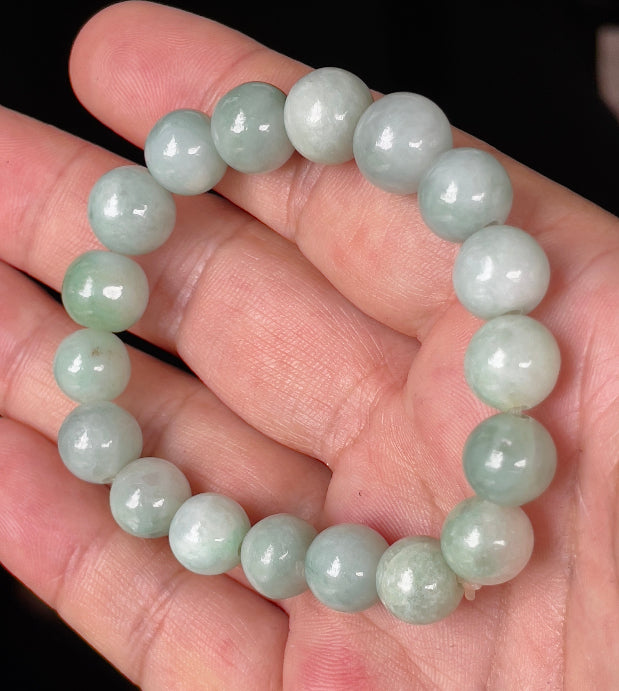 Soft vitreous luster and fine texture of the authentic Myanmar hand-shaped jade bead bracelet JBB136