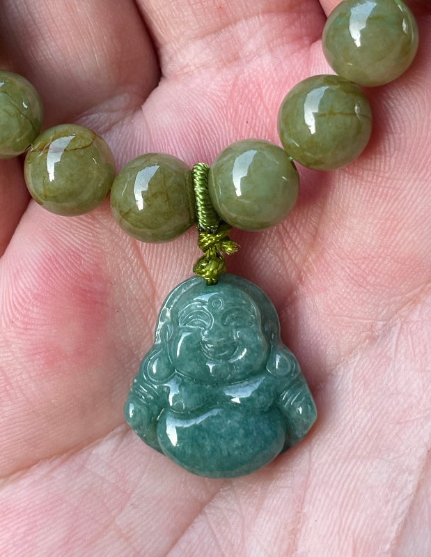 Vitreous luster and fine texture of the authentic Myanmar jade bead bracelet JBB179 with a joy and abundance Laughing Buddha charm