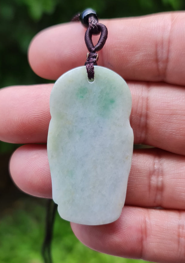 Soft glowing luster and fine texture of the authentic Myanmar jade pendant JP026 showcasing a carved Laughing Buddha Feng Shui design for joy and abundance