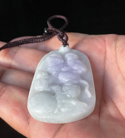 Vitreous luster and fine texture of the authentic Myanmar jade pendant JP021 showcasing a carved double monkey Feng Shui design for joy and companionship