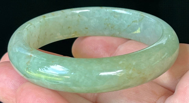 Flat inner profile of 62.1mm icy green Burmese jade bangle JB1302