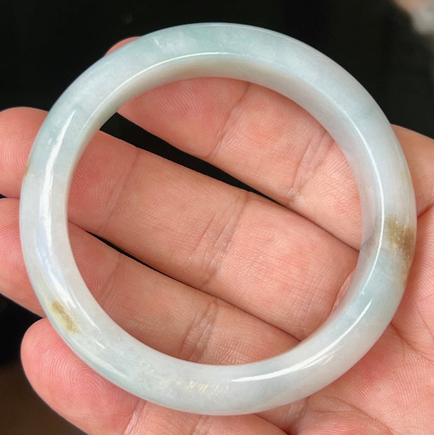 Rounded classic profile of 53mm icy bluish white Burmese jade bangle JB519