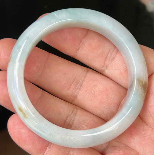 Rounded classic profile of 53mm icy bluish white Burmese jade bangle JB519