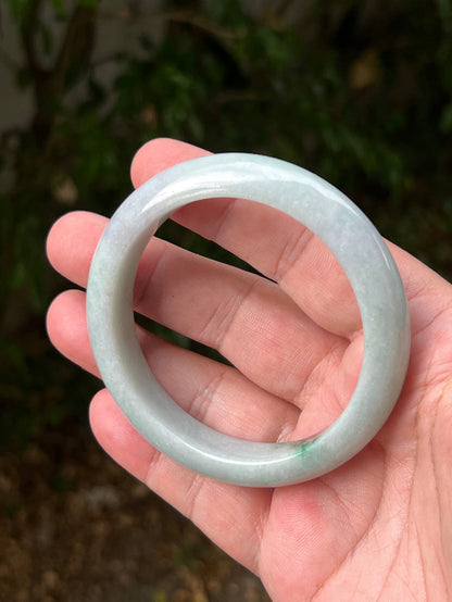 Regular round profile of 60.5mm icy green Burmese jade bangle JB1316