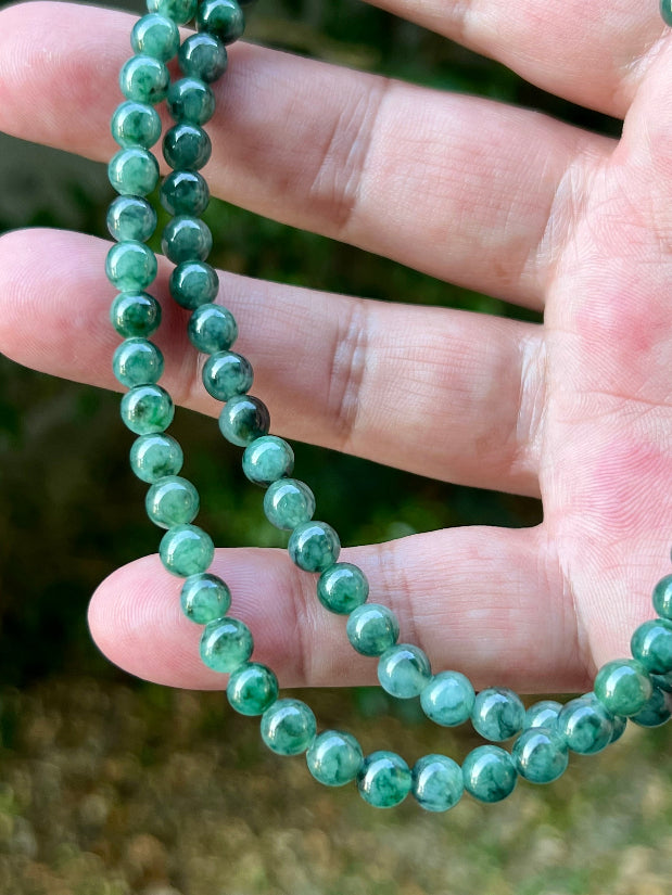 Continuous circle of perfectly round icy imperial and apple green genuine Grade A Burmese jadeite beads