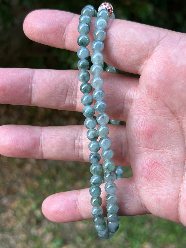 Continuous circle of perfectly round icy imperial and apple green genuine Grade A Burmese jadeite beads