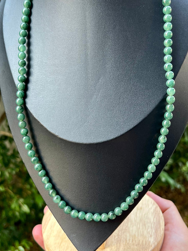 Continuous circle of perfectly round icy imperial and apple green genuine Grade A Burmese jadeite beads