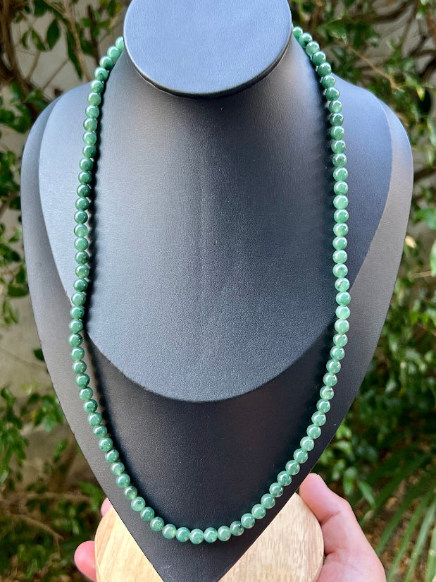 Continuous circle of perfectly round icy imperial and apple green genuine Grade A Burmese jadeite beads