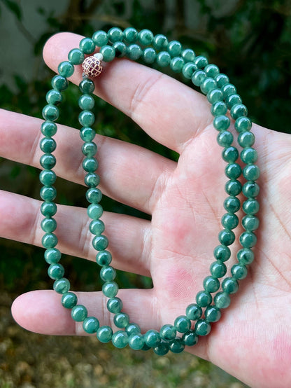 Continuous circle of perfectly round icy imperial and apple green genuine Grade A Burmese jadeite beads