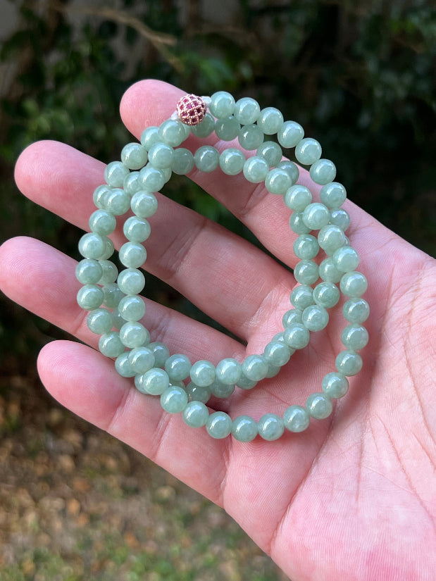 Continuous circle of perfectly round icy imperial and apple green genuine Grade A Burmese jadeite beads