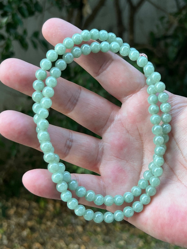 Continuous circle of perfectly round icy imperial and apple green genuine Grade A Burmese jadeite beads