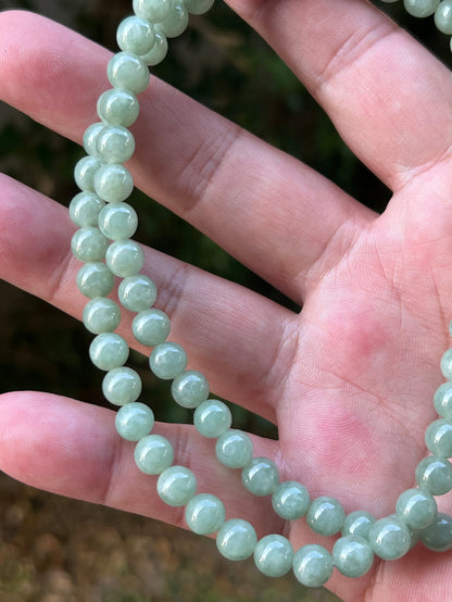 Continuous circle of perfectly round icy imperial and apple green genuine Grade A Burmese jadeite beads