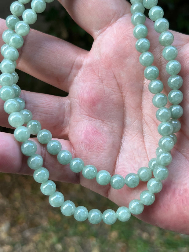 Continuous circle of perfectly round icy imperial and apple green genuine Grade A Burmese jadeite beads