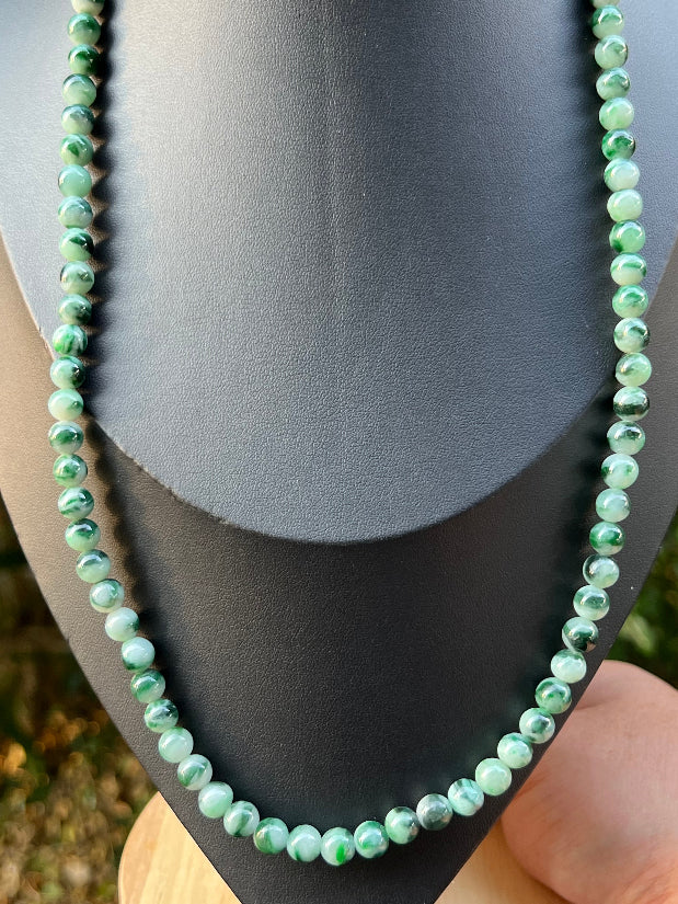 Continuous circle of perfectly round icy imperial and apple green genuine Grade A Burmese jadeite beads