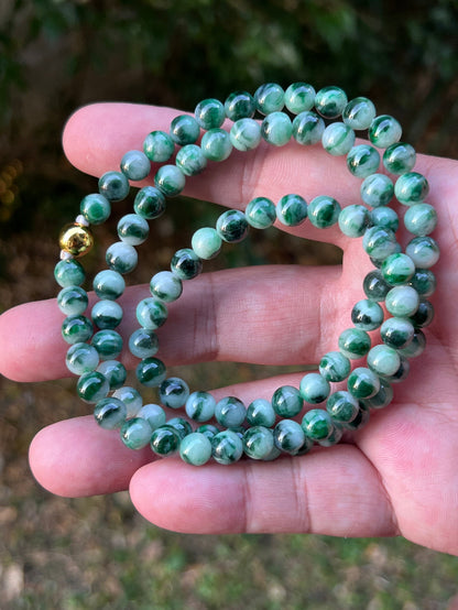 Continuous circle of perfectly round icy imperial and apple green genuine Grade A Burmese jadeite beads