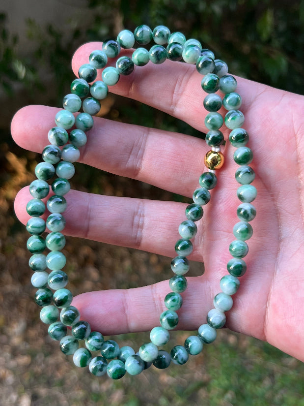 Continuous circle of perfectly round icy imperial and apple green genuine Grade A Burmese jadeite beads
