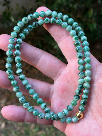 Continuous circle of perfectly round icy imperial and apple green genuine Grade A Burmese jadeite beads