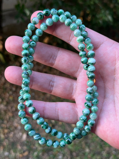 Continuous circle of perfectly round icy imperial and apple green genuine Grade A Burmese jadeite beads