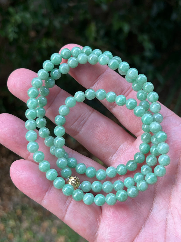 Continuous circle of perfectly round icy imperial and apple green genuine Grade A Burmese jadeite beads
