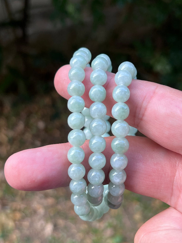 Continuous circle of perfectly round icy imperial and apple green genuine Grade A Burmese jadeite beads