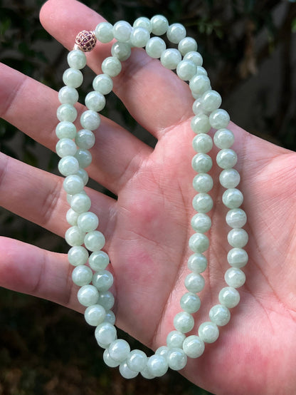 Continuous circle of perfectly round icy imperial and apple green genuine Grade A Burmese jadeite beads