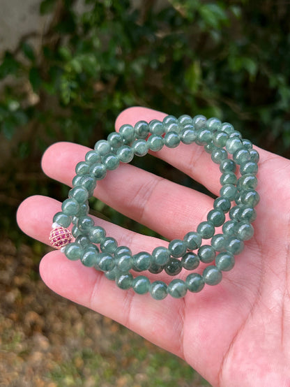 Continuous circle of perfectly round icy imperial and emerald green genuine Grade A Burmese jadeite beads