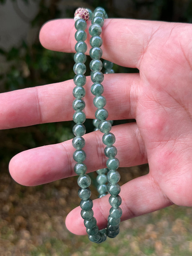 Continuous circle of perfectly round icy imperial and emerald green genuine Grade A Burmese jadeite beads
