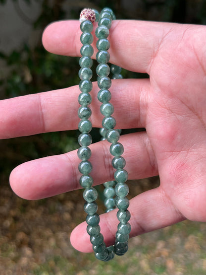 Continuous circle of perfectly round icy imperial and emerald green genuine Grade A Burmese jadeite beads