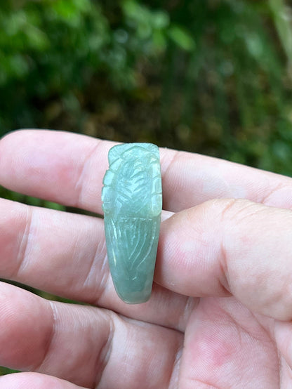 Vitreous luster and cool luminous glow of hand-sculpted certified Grade A Myanmar jadeite jewelry