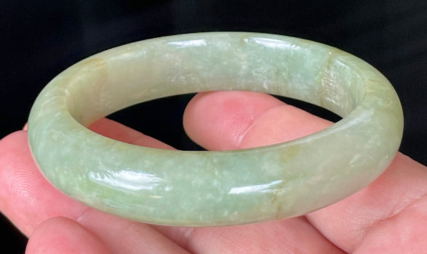 Semi-translucent glassy luster and soft sheen of certified Grade A Myanmar jadeite jewelry