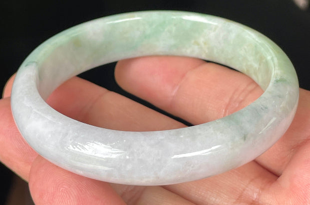 Rounded classic profile of 57mm icy lavender, milky white and green Burmese jade bangle JB356
