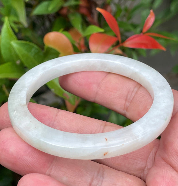 Solid icy milky white natural Type A Burmese jade bangle bracelet in flat inner style, size 58.2mm