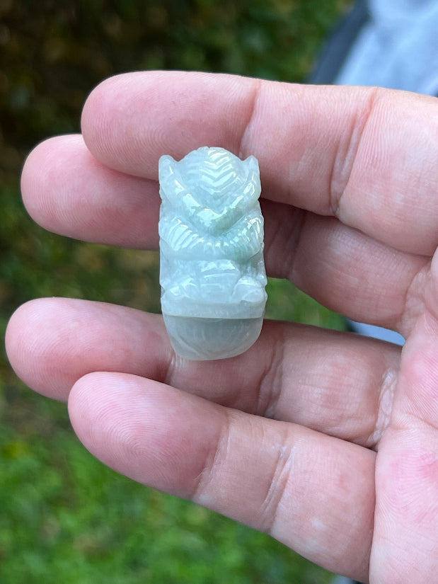 Soft vitreous luster and dimensional appearance of hand-sculpted Grade A Myanmar jadeite jewelry