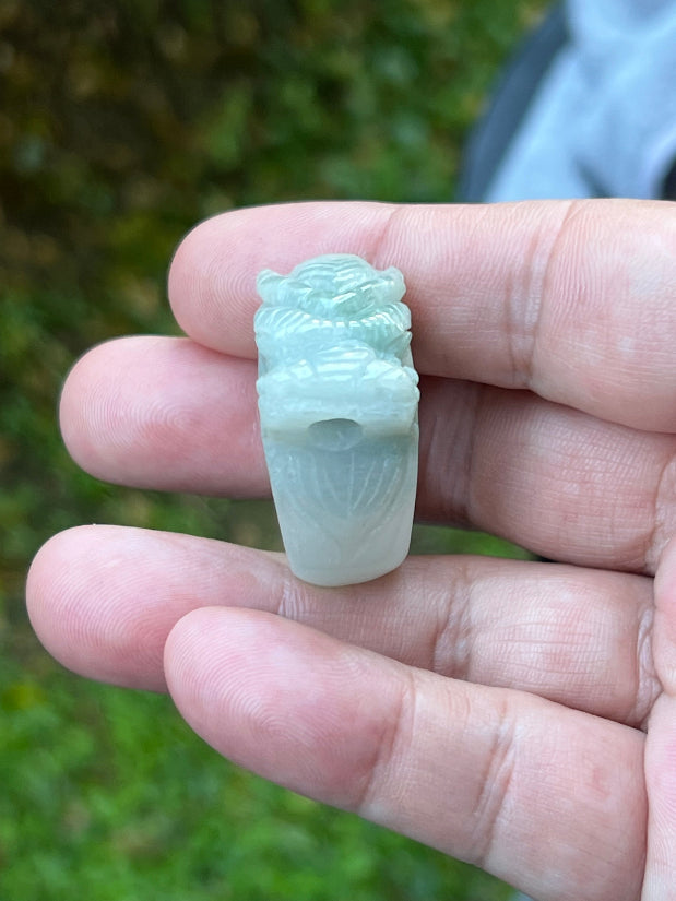 Soft vitreous luster and dimensional appearance of hand-sculpted Grade A Myanmar jadeite jewelry