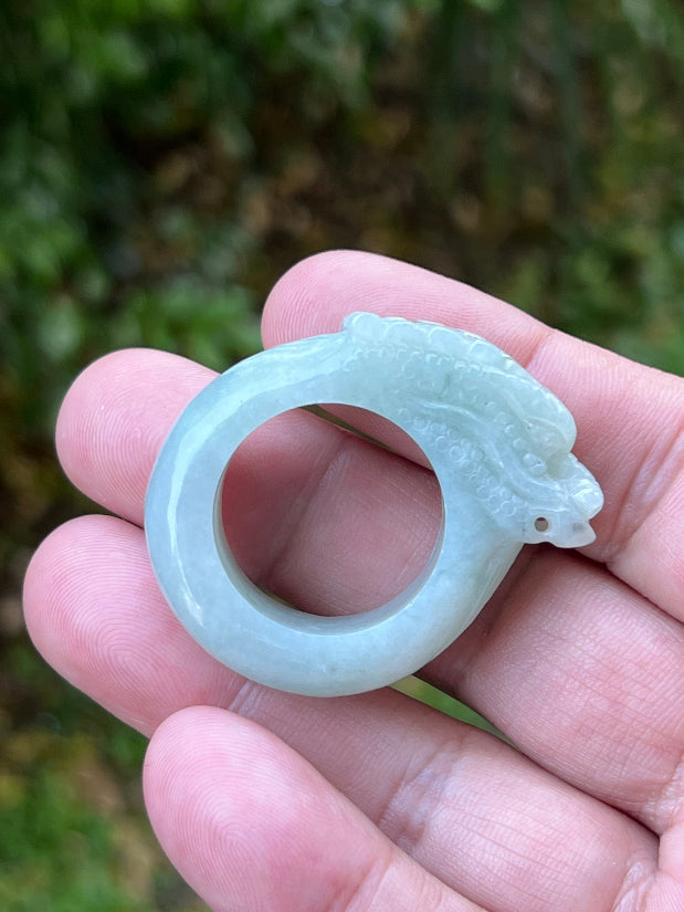 Soft vitreous luster and smooth luminous appearance of hand-sculpted Grade A Myanmar jadeite jewelry