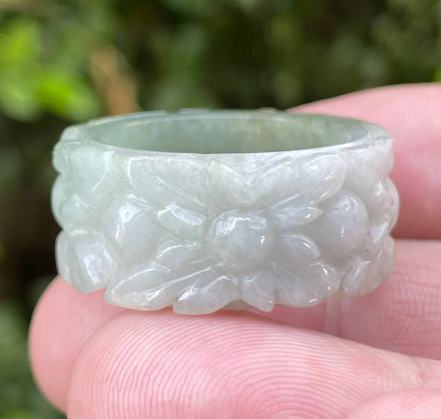 Vitreous luster and semi-translucent glow of hand-sculpted Grade A Myanmar jadeite jewelry