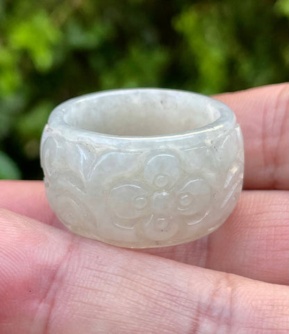 Soft vitreous luster and fine-grained texture of hand-sculpted Grade A Myanmar jadeite jewelry