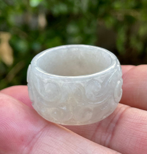 Soft vitreous luster and fine-grained texture of hand-sculpted Grade A Myanmar jadeite jewelry