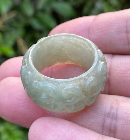 Glassy vitreous luster and semi-translucent texture of hand-sculpted Grade A Myanmar jadeite jewelry