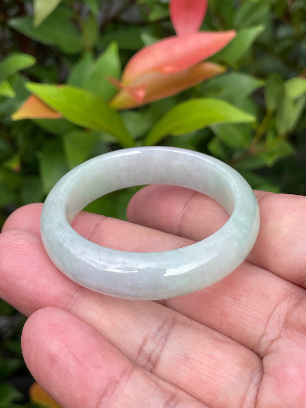 Solid icy imperial green, lavender, and milky white natural Type A Burmese baby jade bangle bracelet in size 39.2mm
