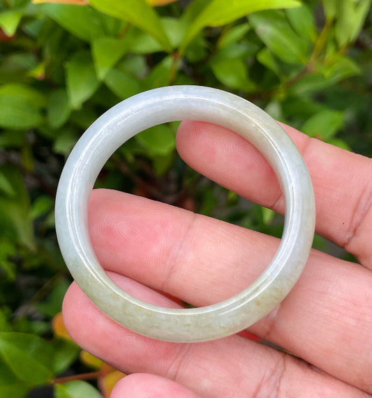 Solid icy white, greyish, and moss green natural Type A Burmese baby jade bangle bracelet in size 40.5mm