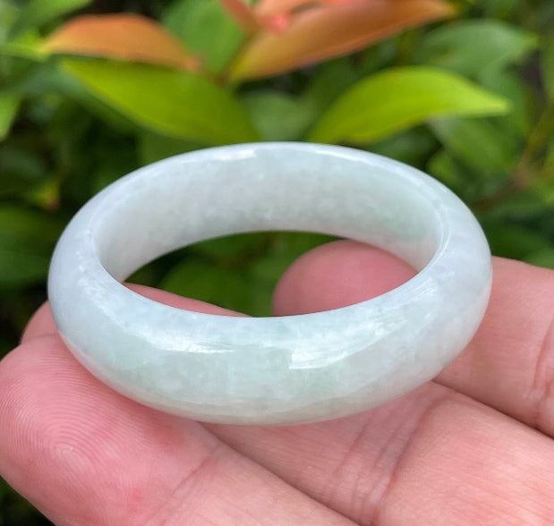 Solid icy light apple green natural Type A Burmese baby jade bangle bracelet in size 36.4mm