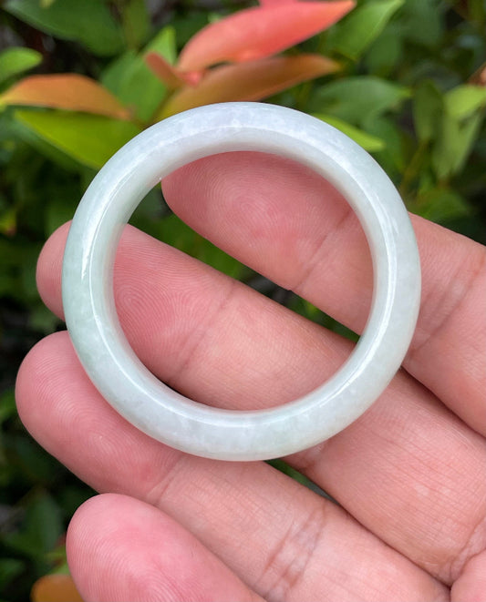 Solid icy light apple green natural Type A Burmese baby jade bangle bracelet in size 36.4mm